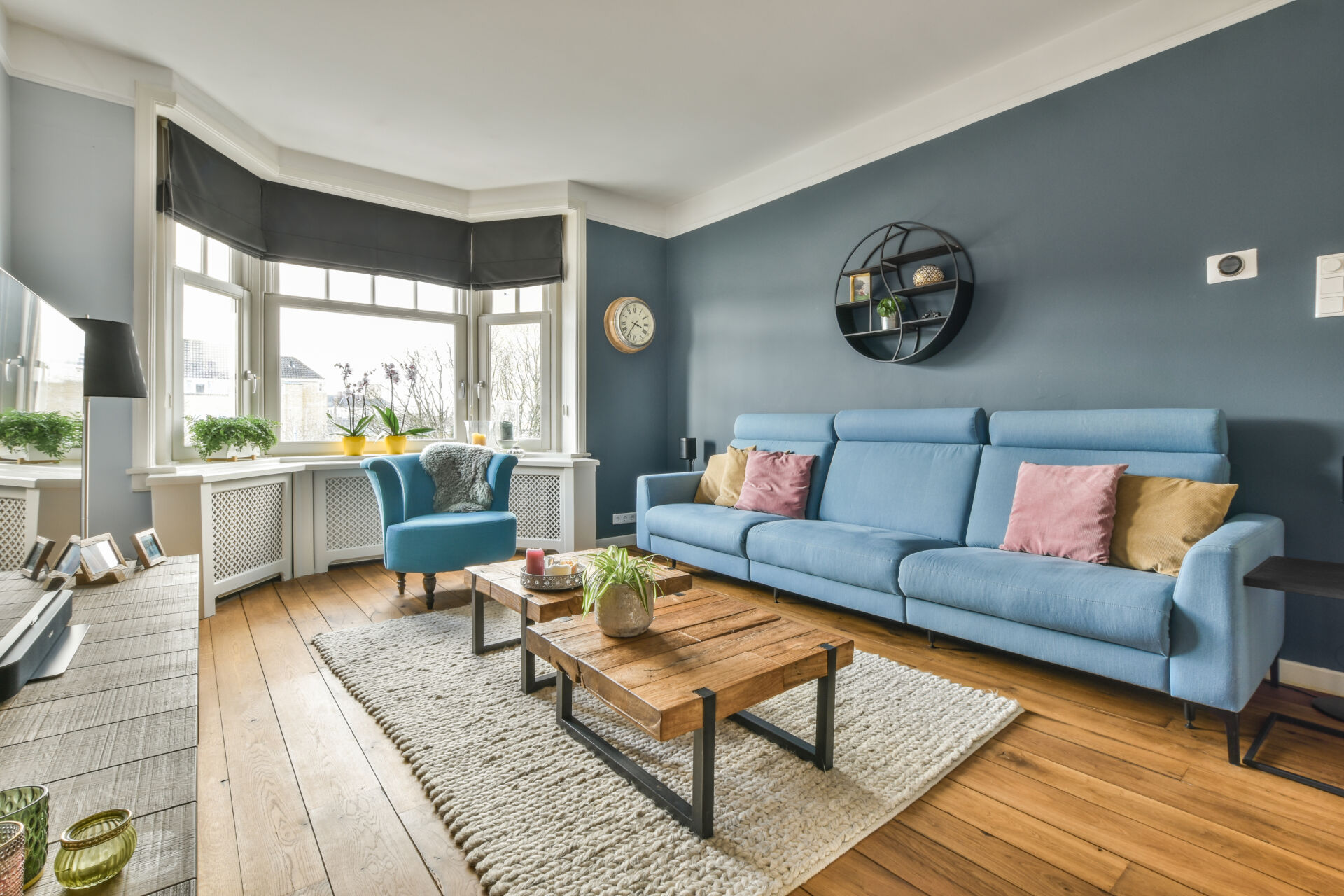 Ashford Lettings - Comfortable living room with pastel sofa for rent in Herne Bay, Kent