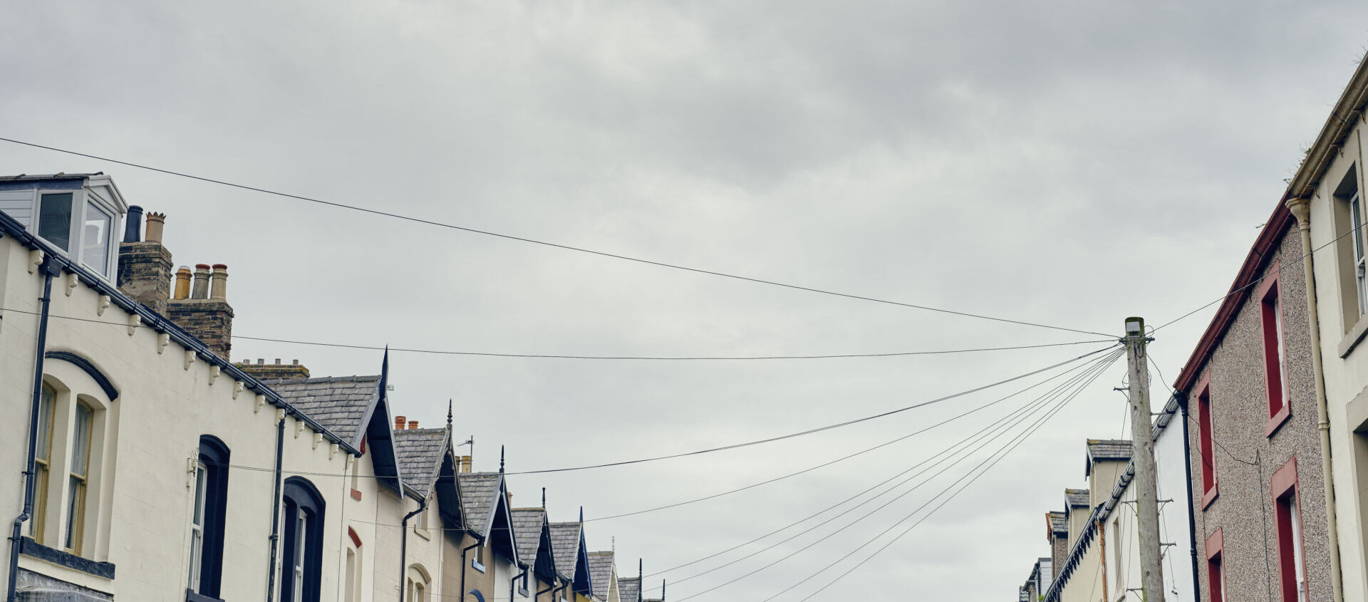Ashford Lettings - Low angle of row of terraced house to rent support for landlord in Ashford, Kent